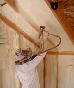 spraying insulation in Montopolis home